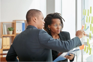 Two people brainstorming